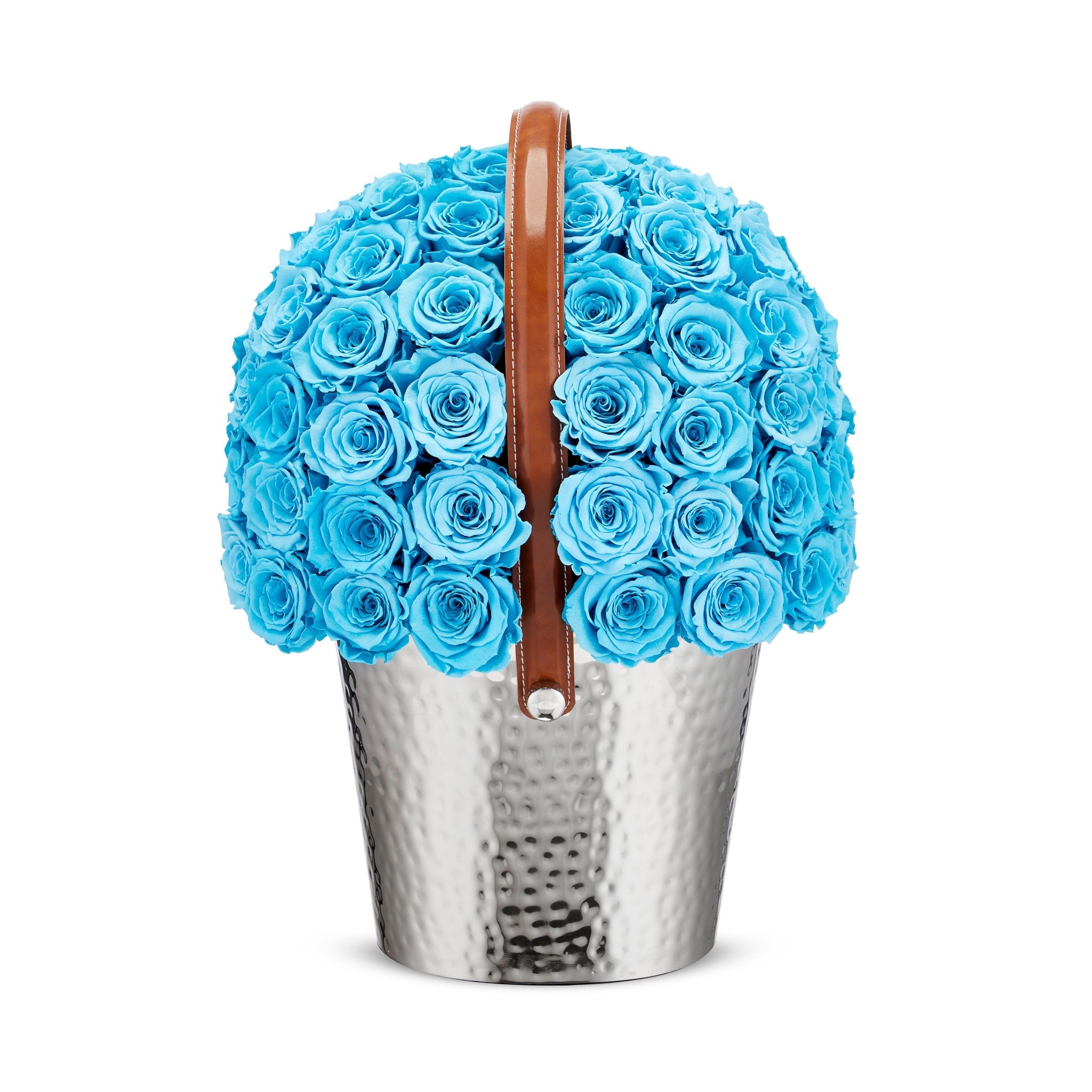 Bouquet of blue roses in a silver vase with a brown handle on a white background