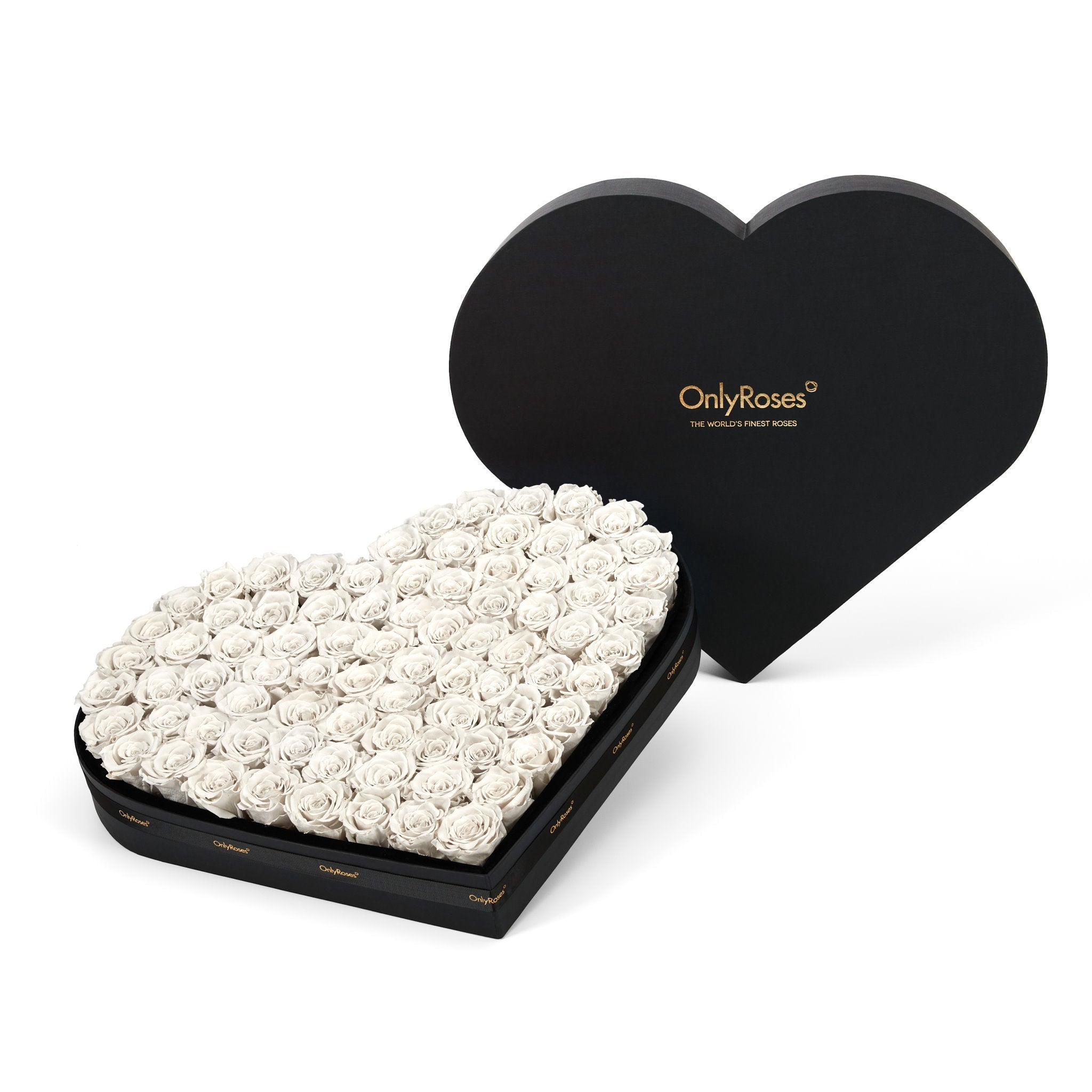 Heart-shaped box filled with white roses and branded lid on a white background
