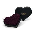 Heart-shaped box of purple roses with 'OnlyRoses' branding on a white background
